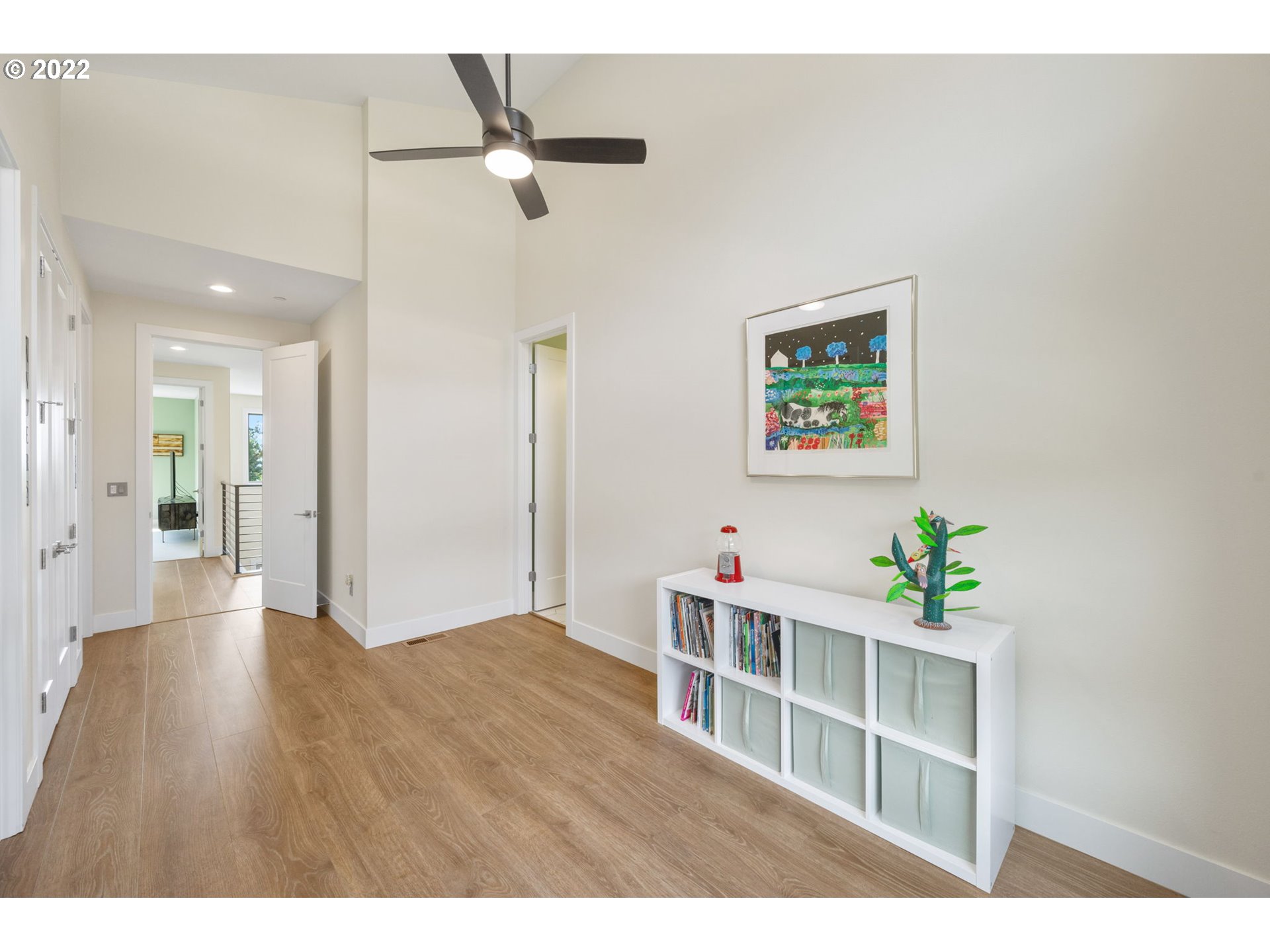 3865 Northwest Celebration Lane Camas, WA 98607 - Photo 22 of 32 a living room with furniture and a wooden floor