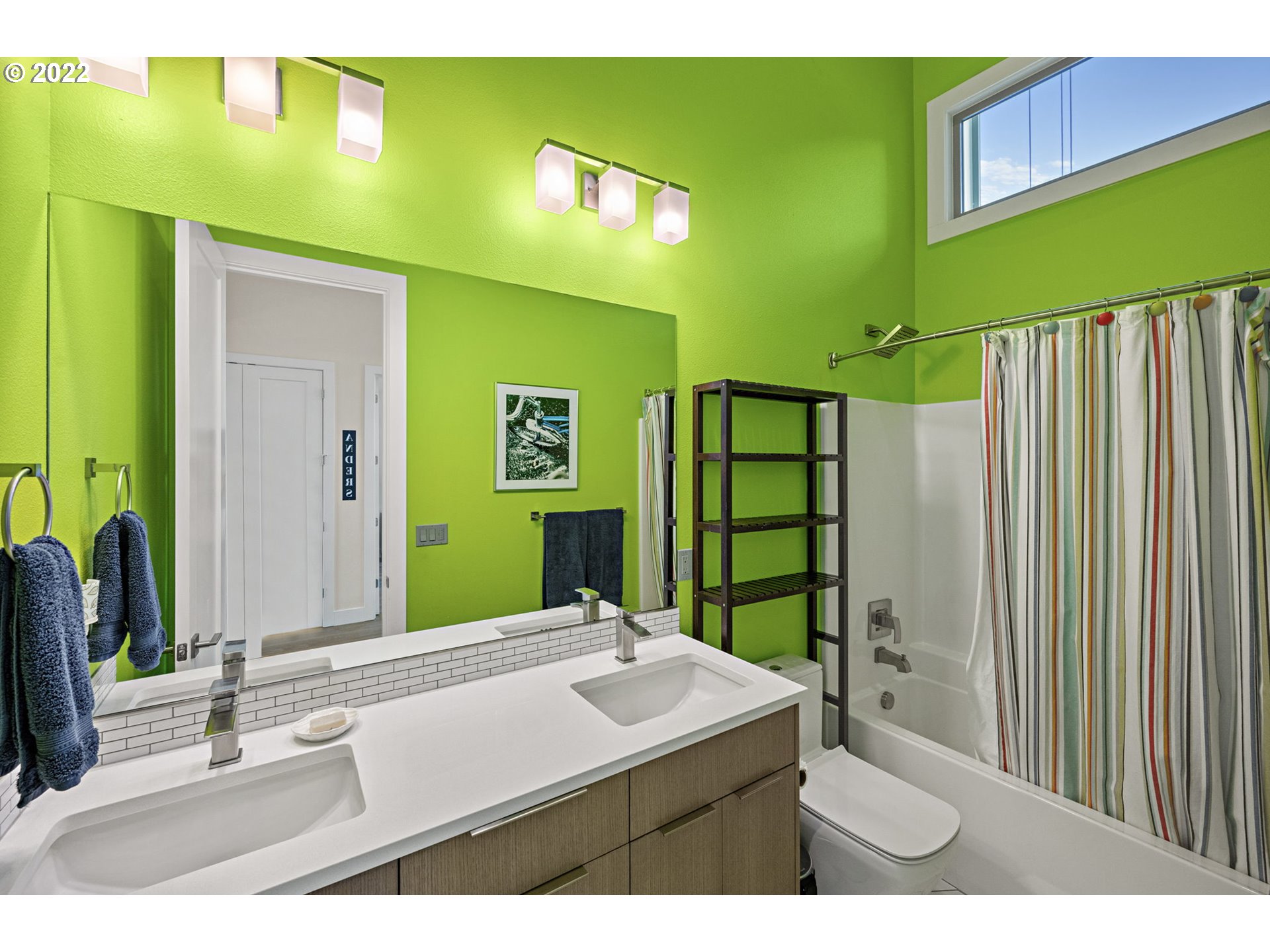 3865 Northwest Celebration Lane Camas, WA 98607 - Photo 23 of 32 a bathroom with a sink and a mirror