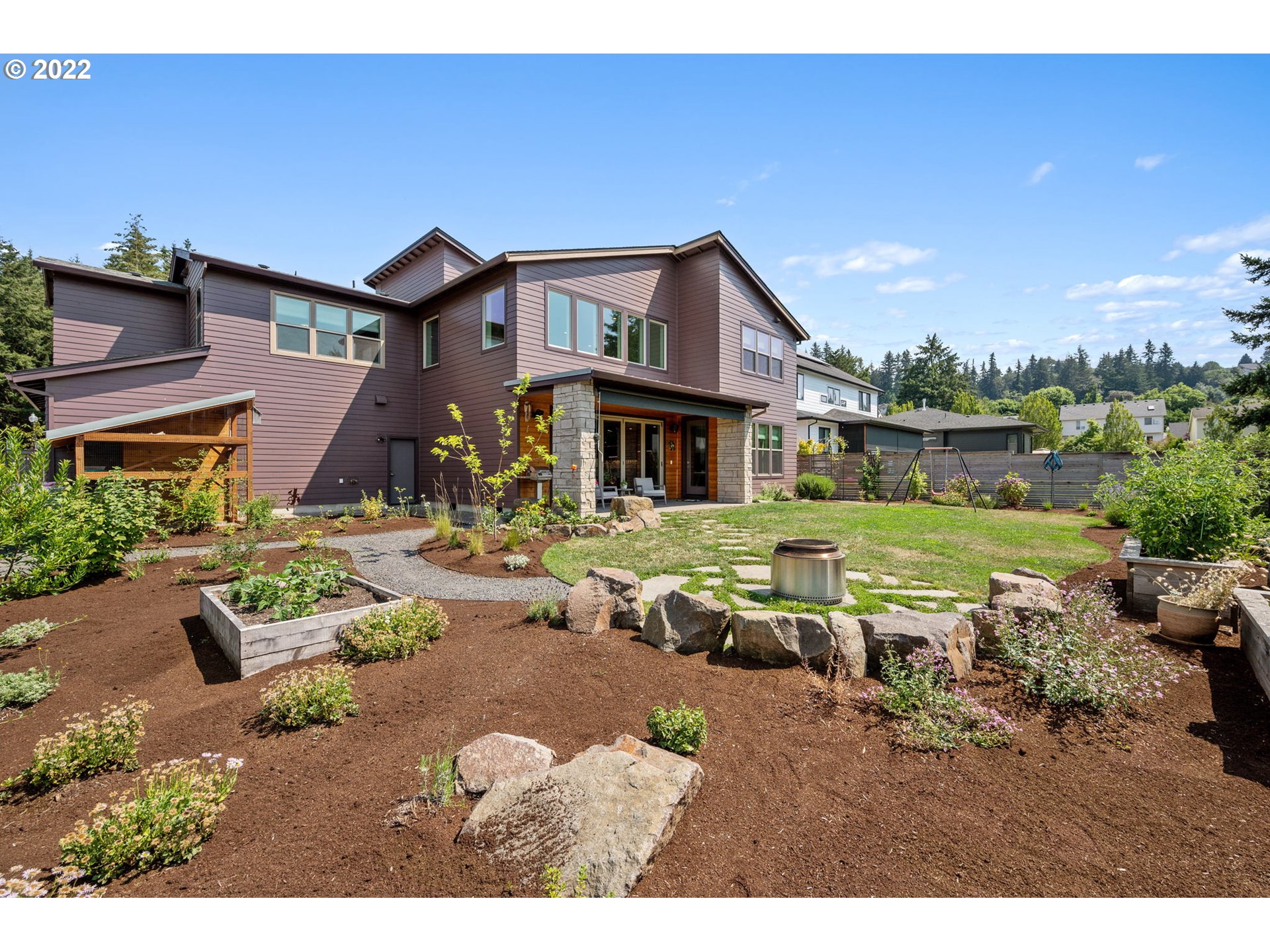 3865 Northwest Celebration Lane Camas, WA 98607 - Photo 31 of 32 a view of a house with a yard