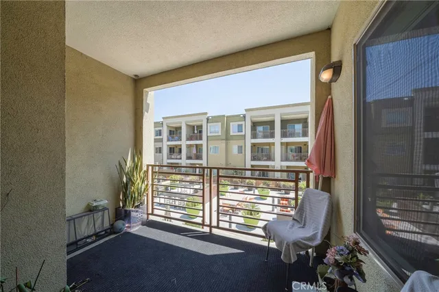 a view of a room with a large window