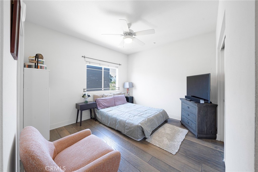 2976 Ripple Place, Unit 201 Los Angeles, CA 90039 - Photo 7 of 19 a bedroom with a bed and a couch