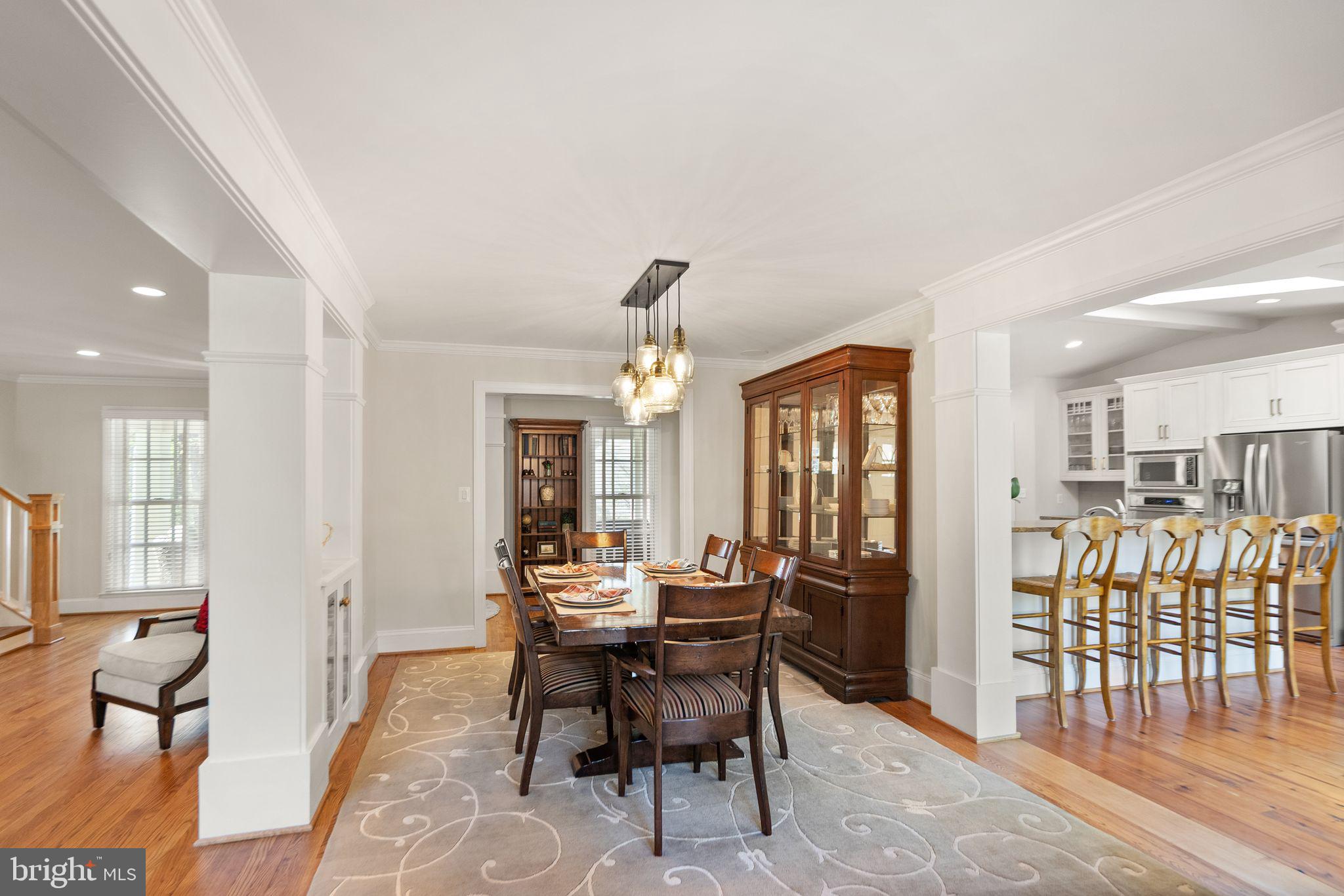 11809 Wayland Street Oakton, VA 22124 - Photo 18 of 97 a view of a a dining room with furniture window and wooden floor