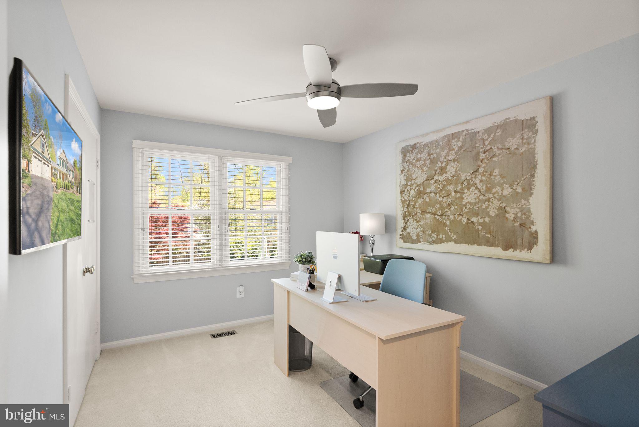 11809 Wayland Street Oakton, VA 22124 - Photo 42 of 97 a view of a room that has a window and a table in it