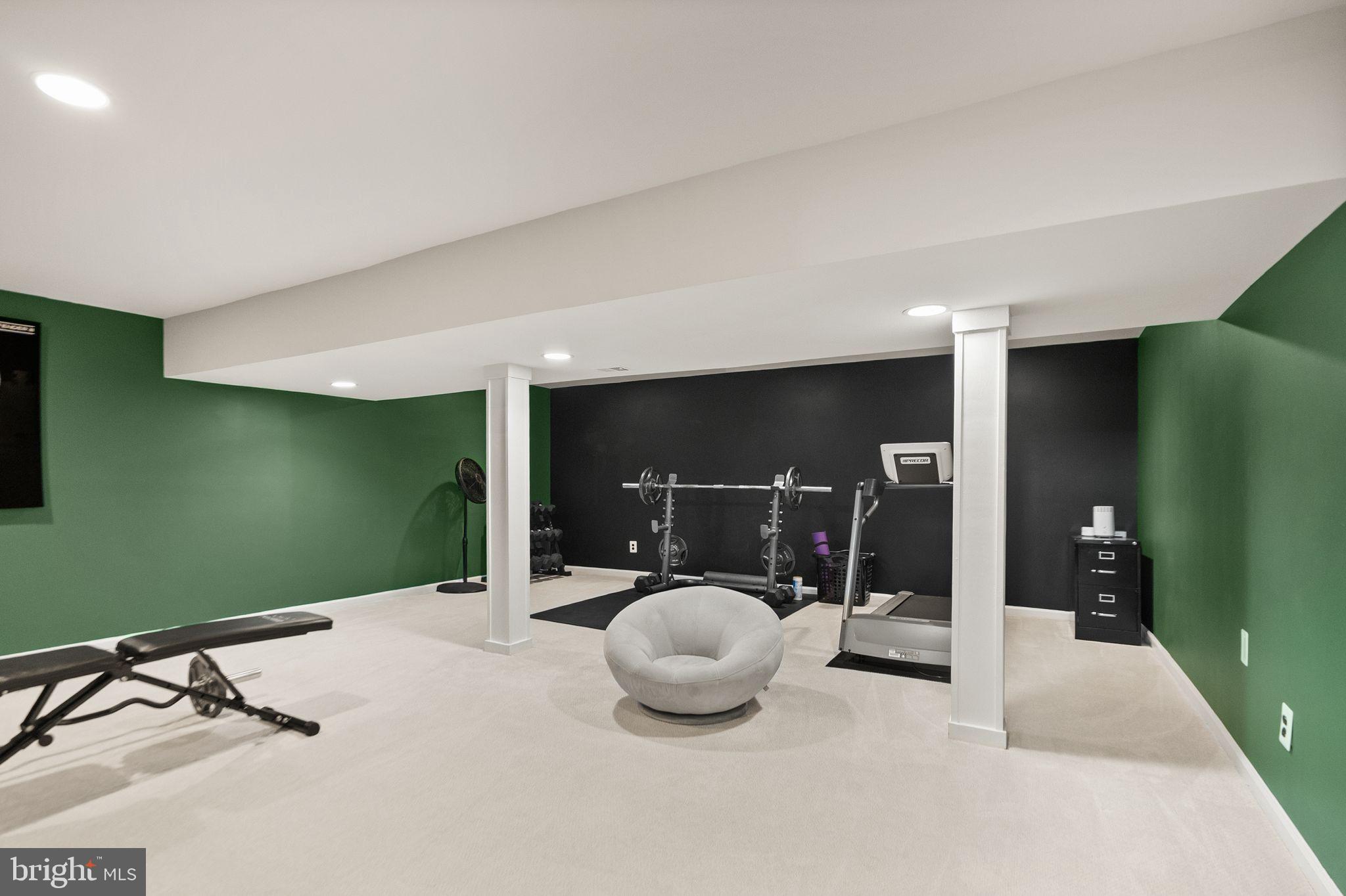 11809 Wayland Street Oakton, VA 22124 - Photo 55 of 97 a room with table gym equipment and view of living room