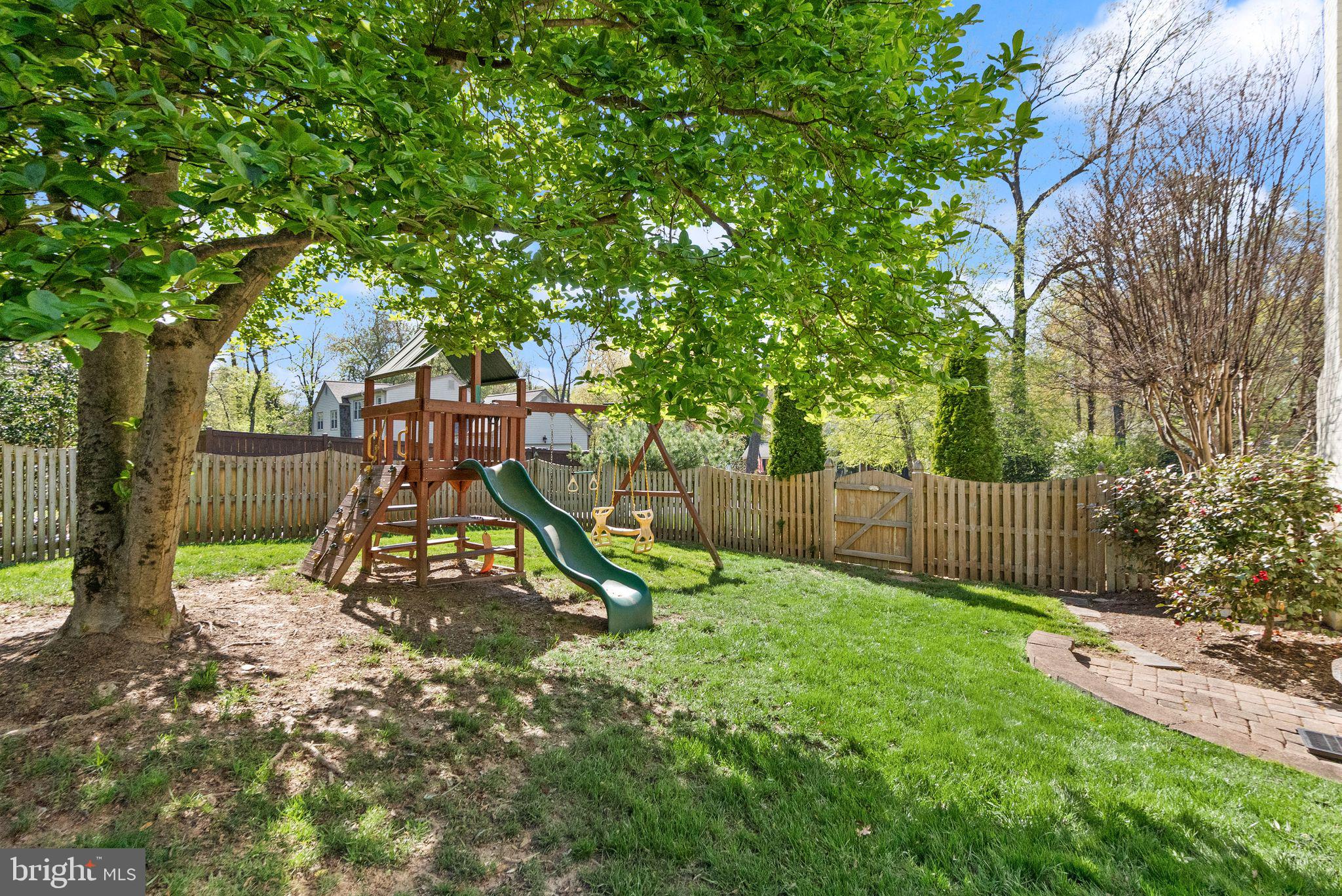 11809 Wayland Street Oakton, VA 22124 - Photo 81 of 97 a view of a park with a slide