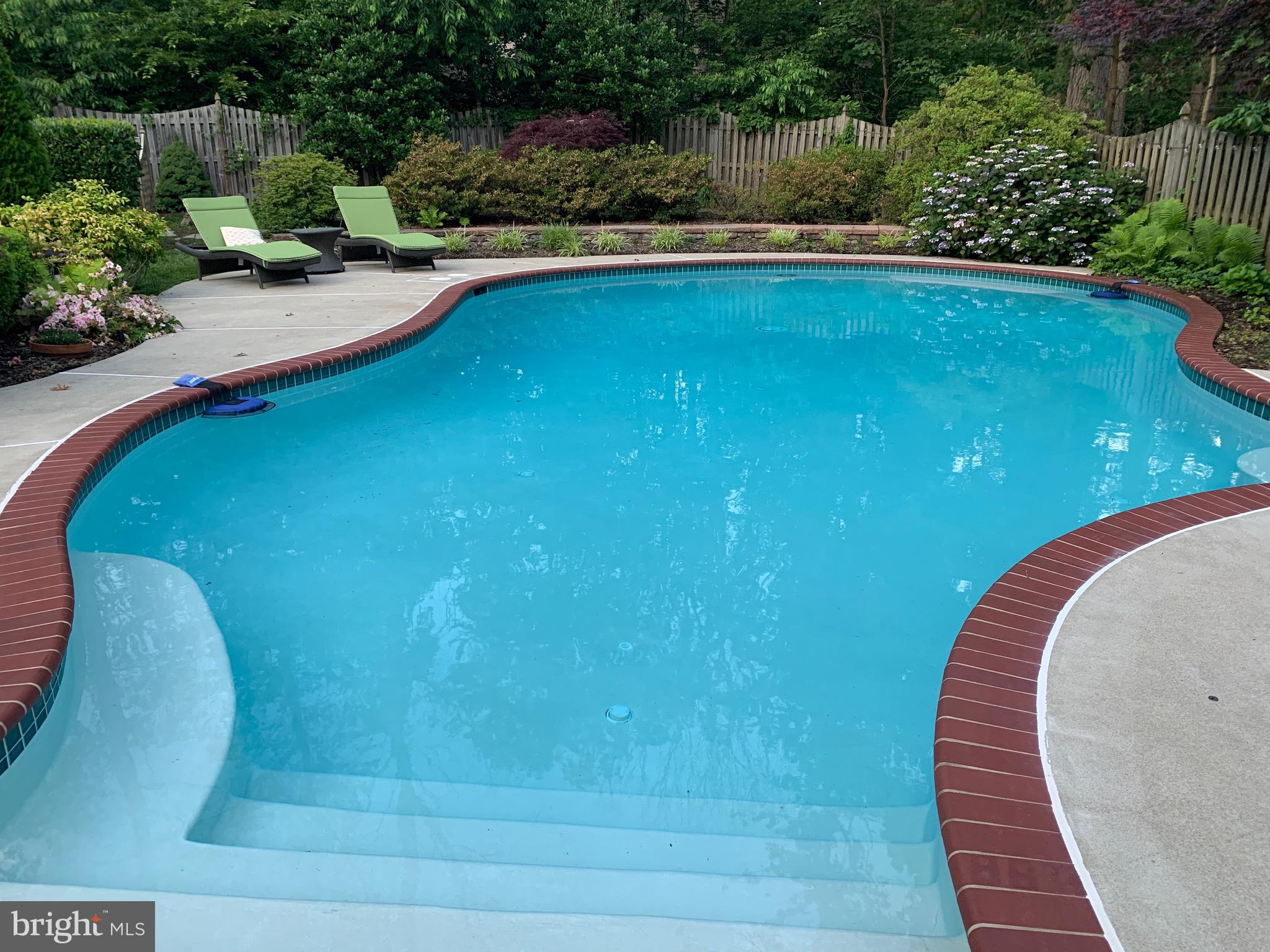 11809 Wayland Street Oakton, VA 22124 - Photo 95 of 97 a view of a swimming pool with a yard