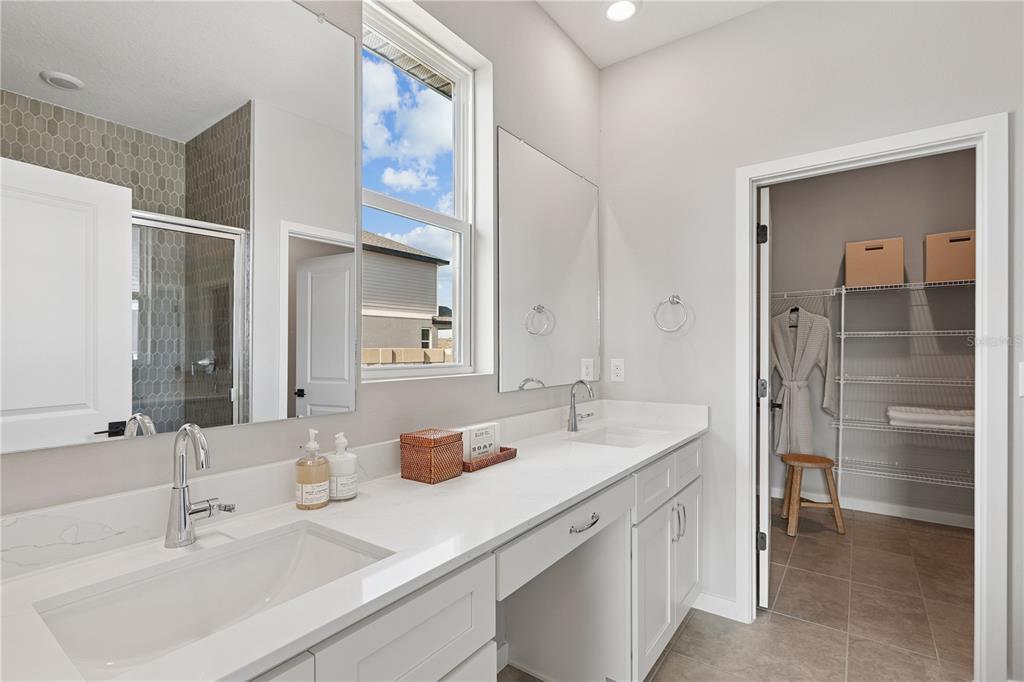 4474 Northwest 37th St Road Ocala, FL 34482 - Photo 14 of 16 a bathroom with a sink double vanity and a mirror