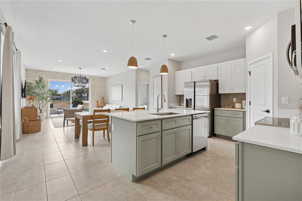 4474 Northwest 37th St Road Ocala, FL 34482 - Photo 8 of 16 a kitchen with appliances cabinets and furniture
