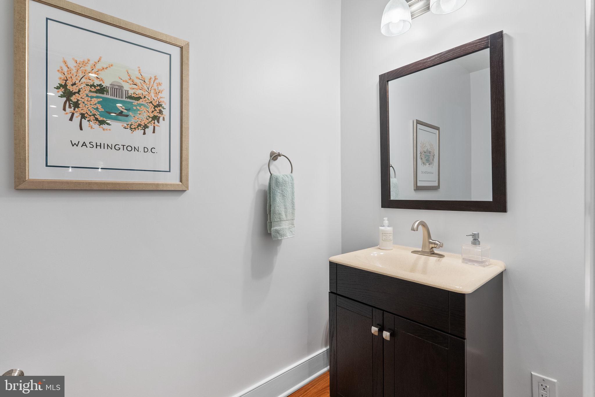 1418 North Rhodes Street, Unit B423 Arlington, VA 22209 - Photo 14 of 36 Convenient powder room off front foyer