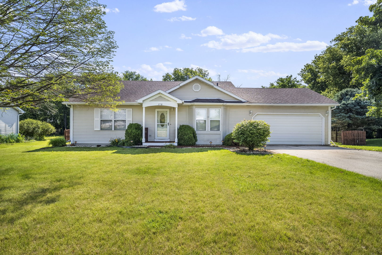 3778 East 2708th Road Sheridan, IL 60551 - Photo 1 of 32 a front view of a house with a garden