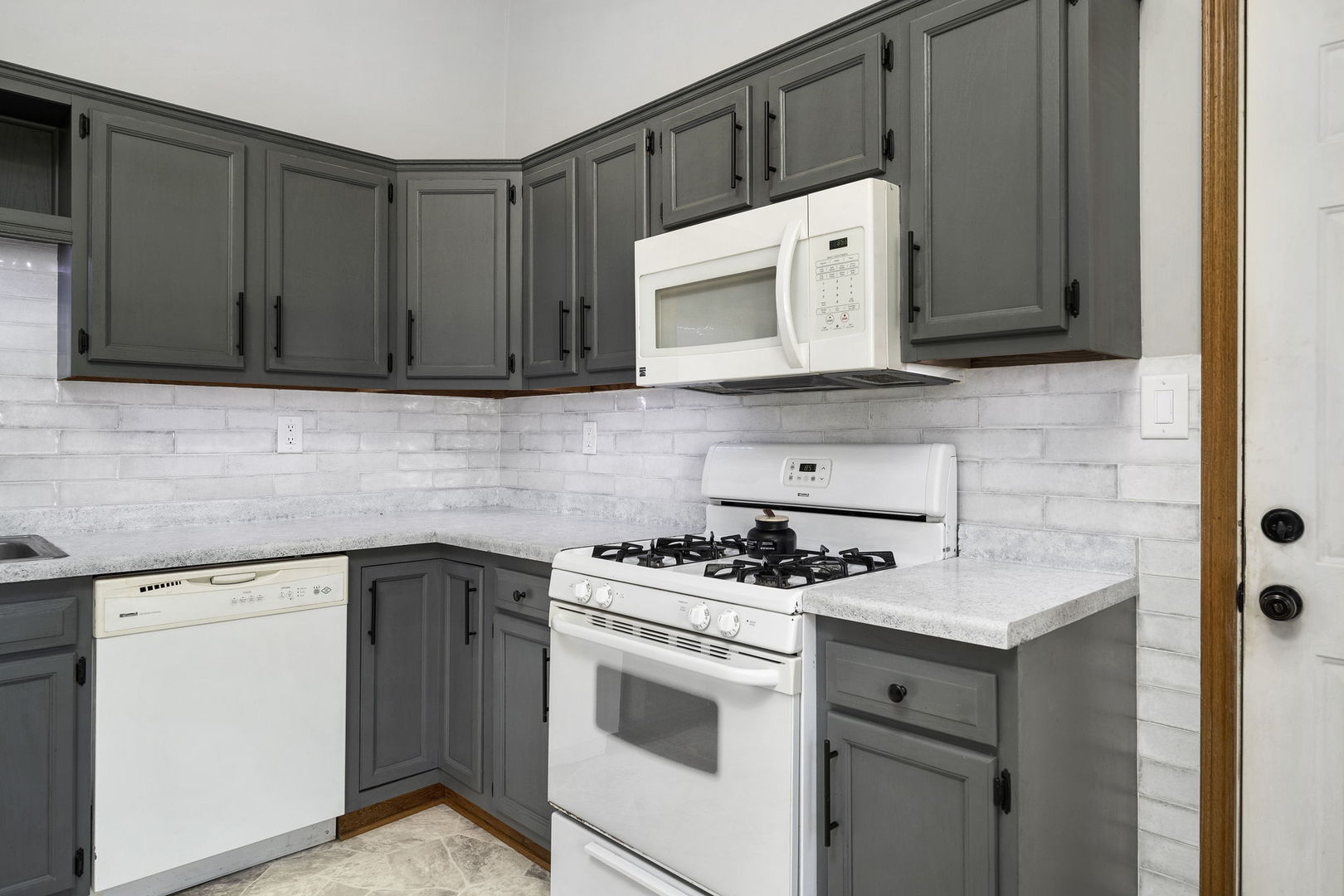 3778 East 2708th Road Sheridan, IL 60551 - Photo 9 of 32 a kitchen with cabinets stainless steel appliances and sink