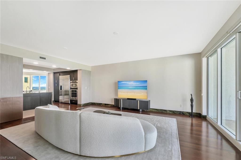 275 Indies Way, Unit 1605 Naples, FL 34110 - Photo 14 of 50 a living room with furniture and a window