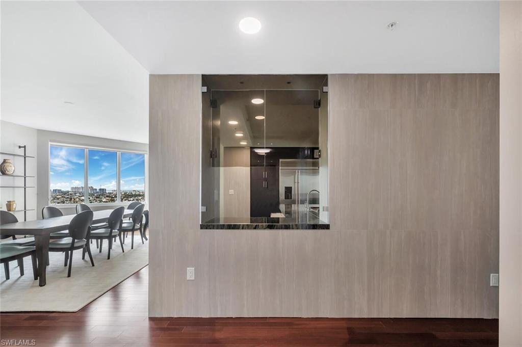 275 Indies Way, Unit 1605 Naples, FL 34110 - Photo 3 of 50 a view of a living room and dining room