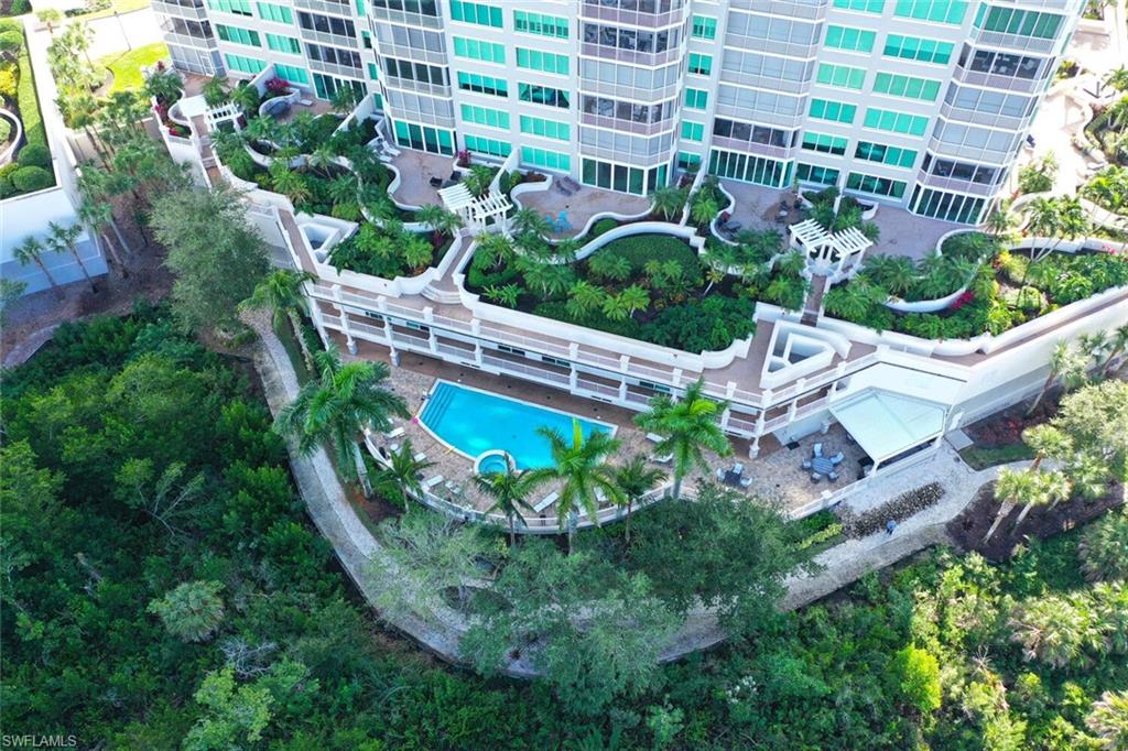 275 Indies Way, Unit 1605 Naples, FL 34110 - Photo 34 of 50 an aerial view of a house with a garden and plants