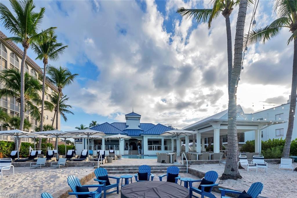 275 Indies Way, Unit 1605 Naples, FL 34110 - Photo 38 of 50 a front view of a building with sitting space