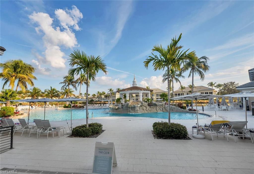 275 Indies Way, Unit 1605 Naples, FL 34110 - Photo 45 of 50 a roof deck with outdoor seating and water view