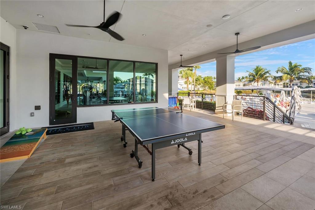 275 Indies Way, Unit 1605 Naples, FL 34110 - Photo 48 of 50 a view of a dining room with furniture window and outside view