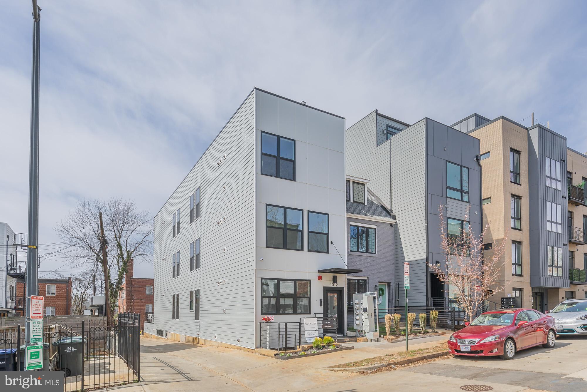 1012 17th Place Northeast, Unit 1 Washington, DC 20002 - Photo 16 of 18 a car parked in front of a building
