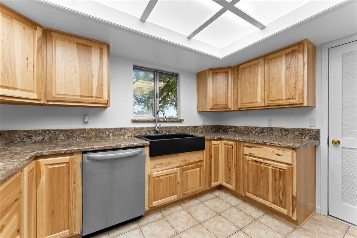 5210 Balls Ferry Road Anderson, CA 96007 - Photo 11 of 68 a kitchen with granite countertop cabinets stainless steel appliances a sink and window