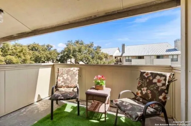 a car parked in front of a brick house