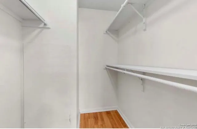 a balcony with table and chairs