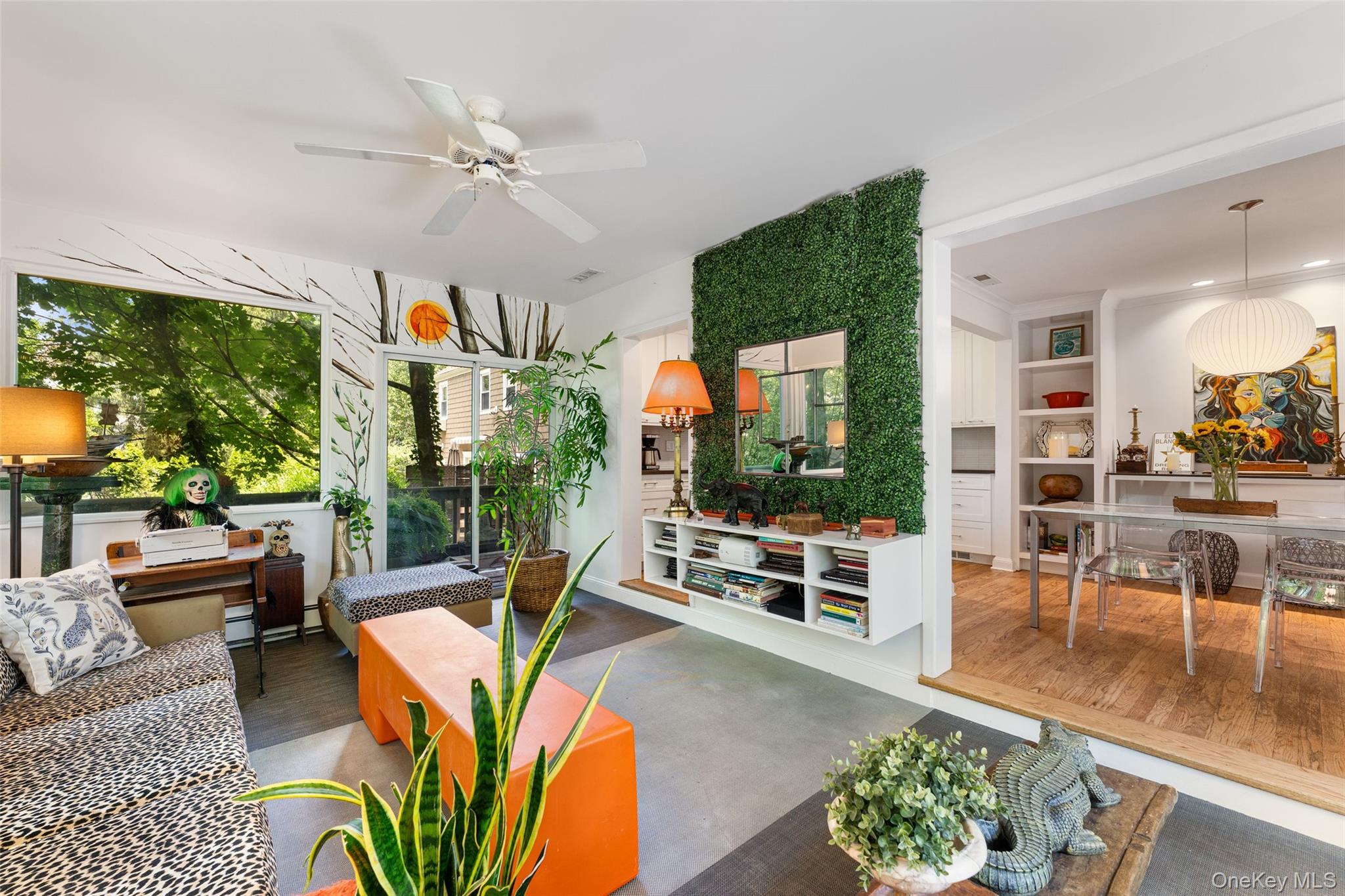 5 Coralyn Road Scarsdale, NY 10583 - Photo 15 of 44 a living room with furniture a floor to ceiling window and a potted plant