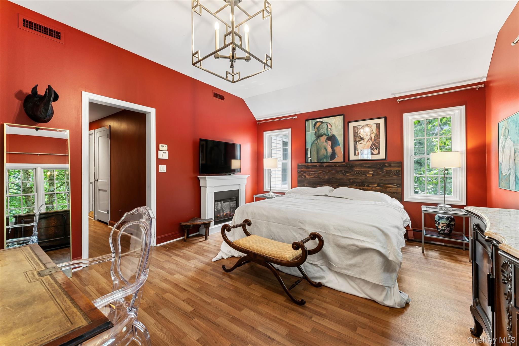 5 Coralyn Road Scarsdale, NY 10583 - Photo 18 of 44 a bed sitting in a bedroom next to a window