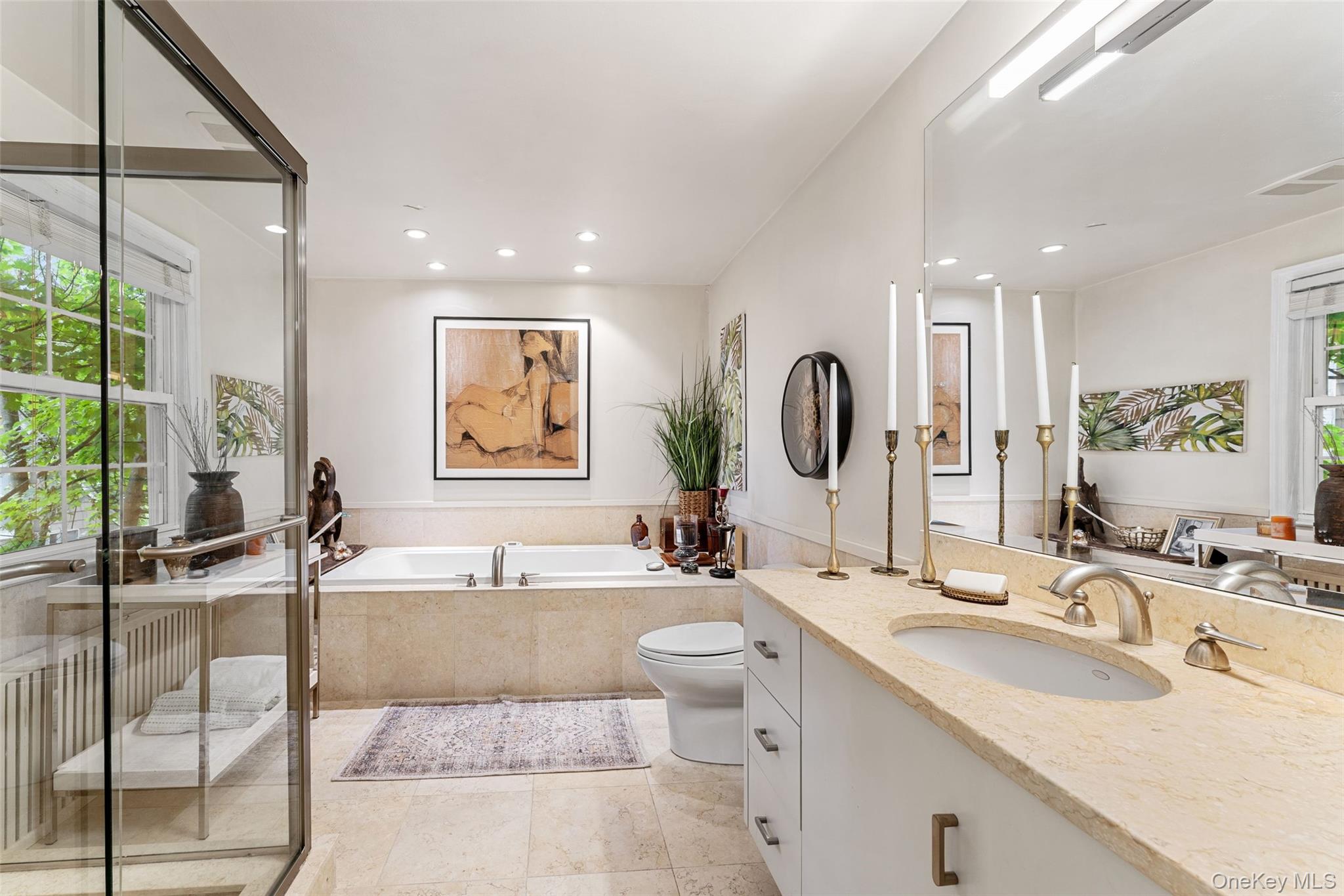 5 Coralyn Road Scarsdale, NY 10583 - Photo 20 of 44 a bathroom with a granite countertop sink mirror and bathtub