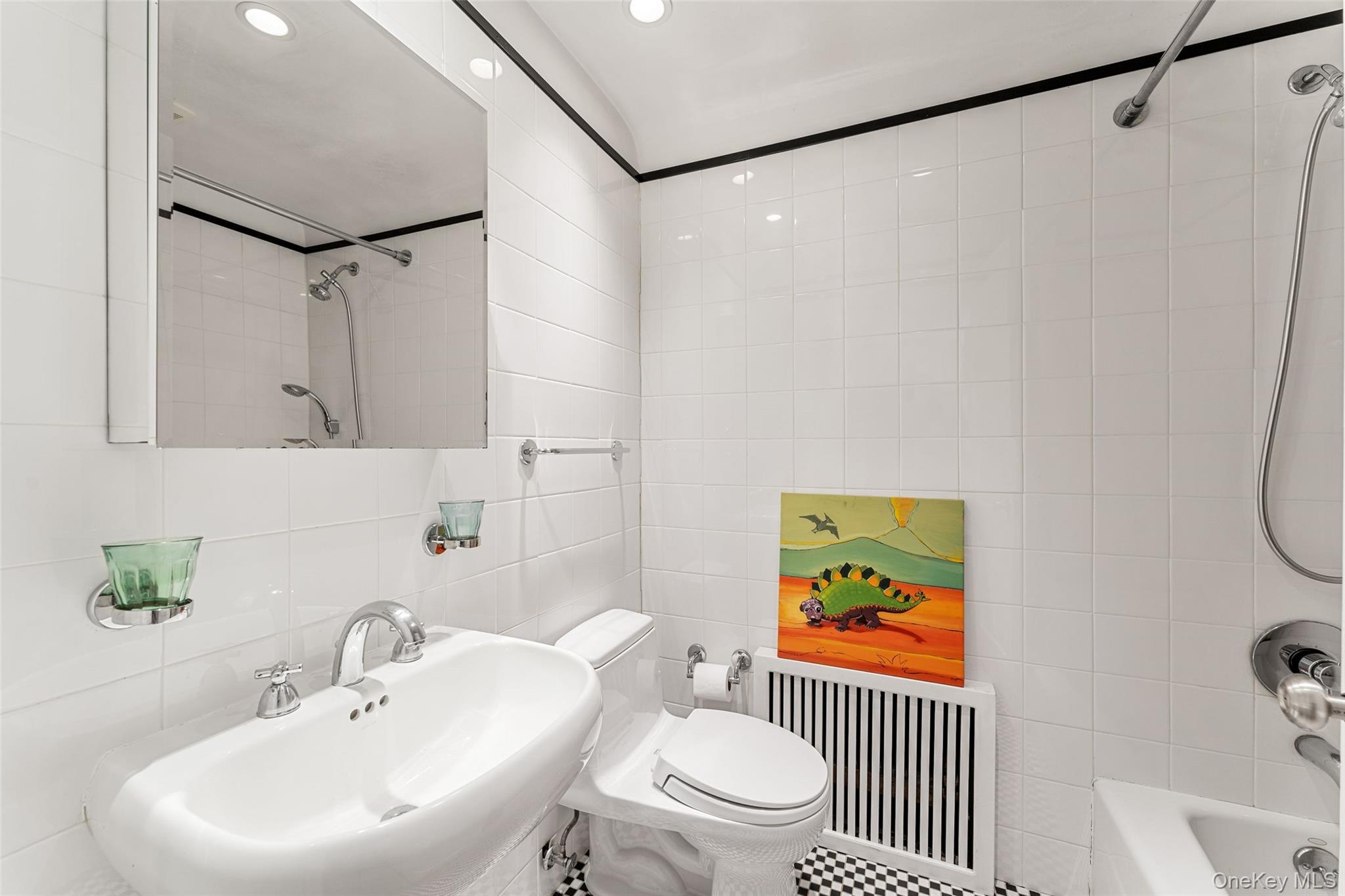 5 Coralyn Road Scarsdale, NY 10583 - Photo 26 of 44 a bathroom with a sink toilet and shower