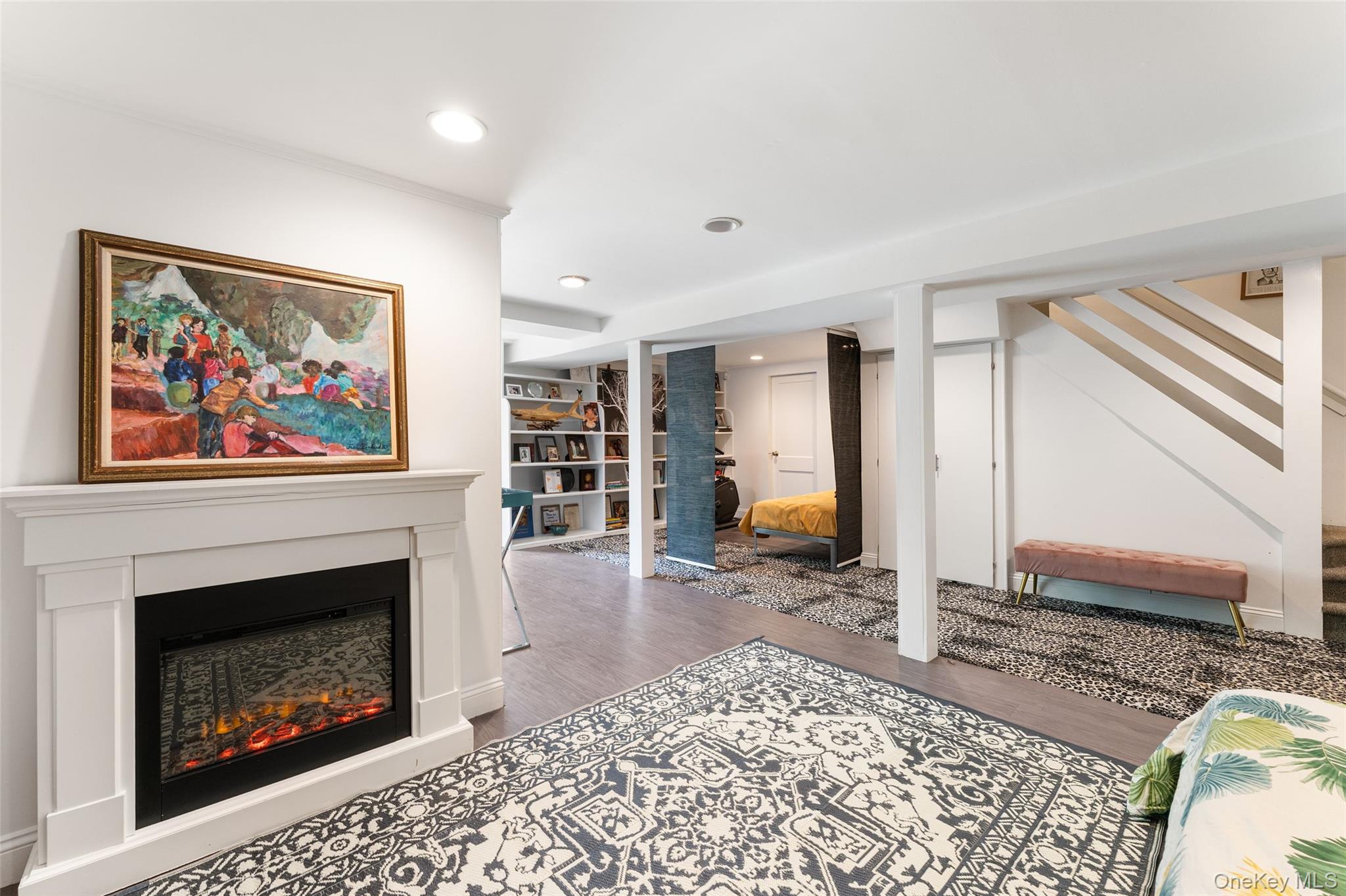 5 Coralyn Road Scarsdale, NY 10583 - Photo 28 of 44 a living room with furniture a rug and a fireplace