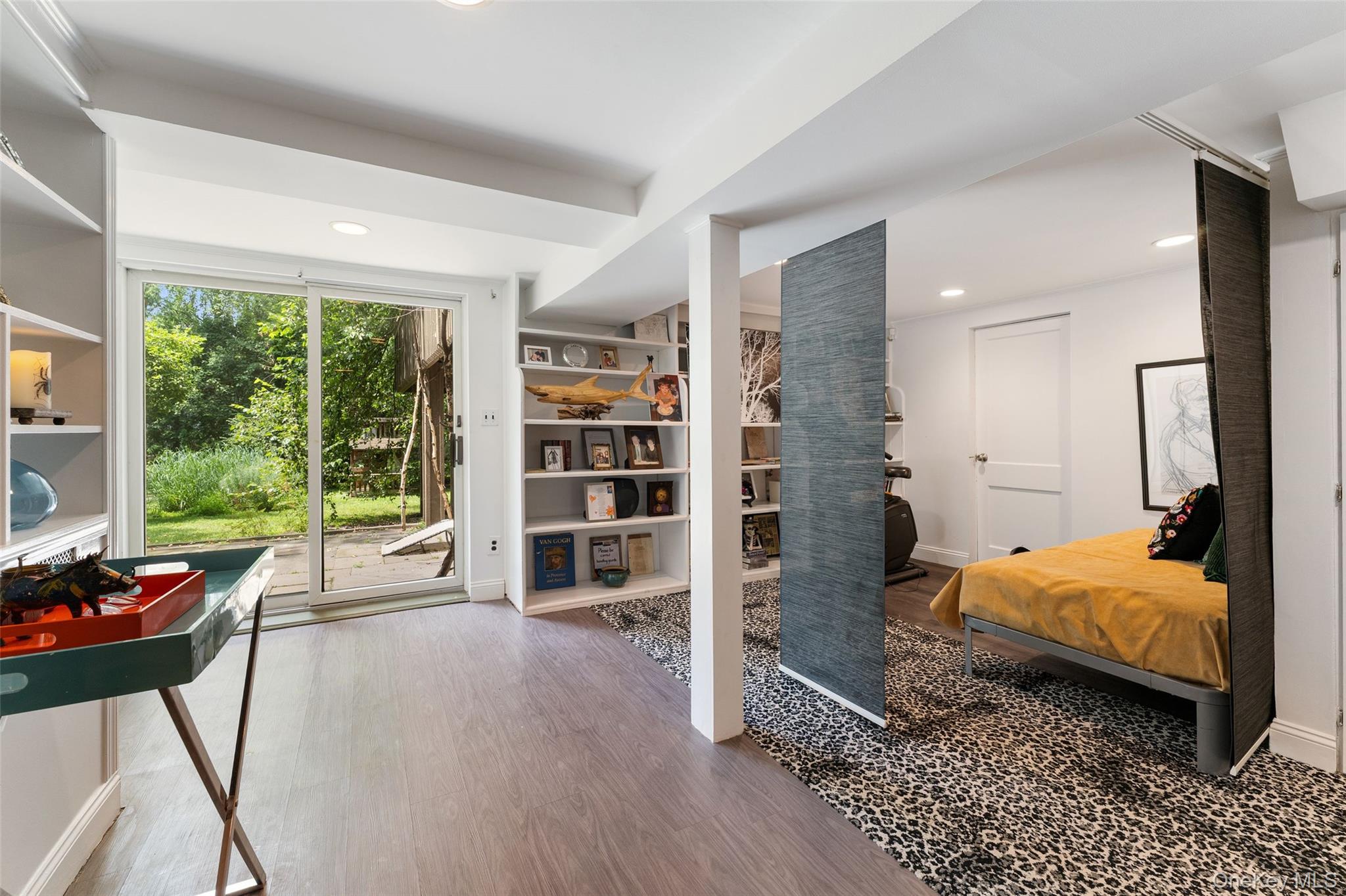 5 Coralyn Road Scarsdale, NY 10583 - Photo 29 of 44 a bedroom with furniture and a large window