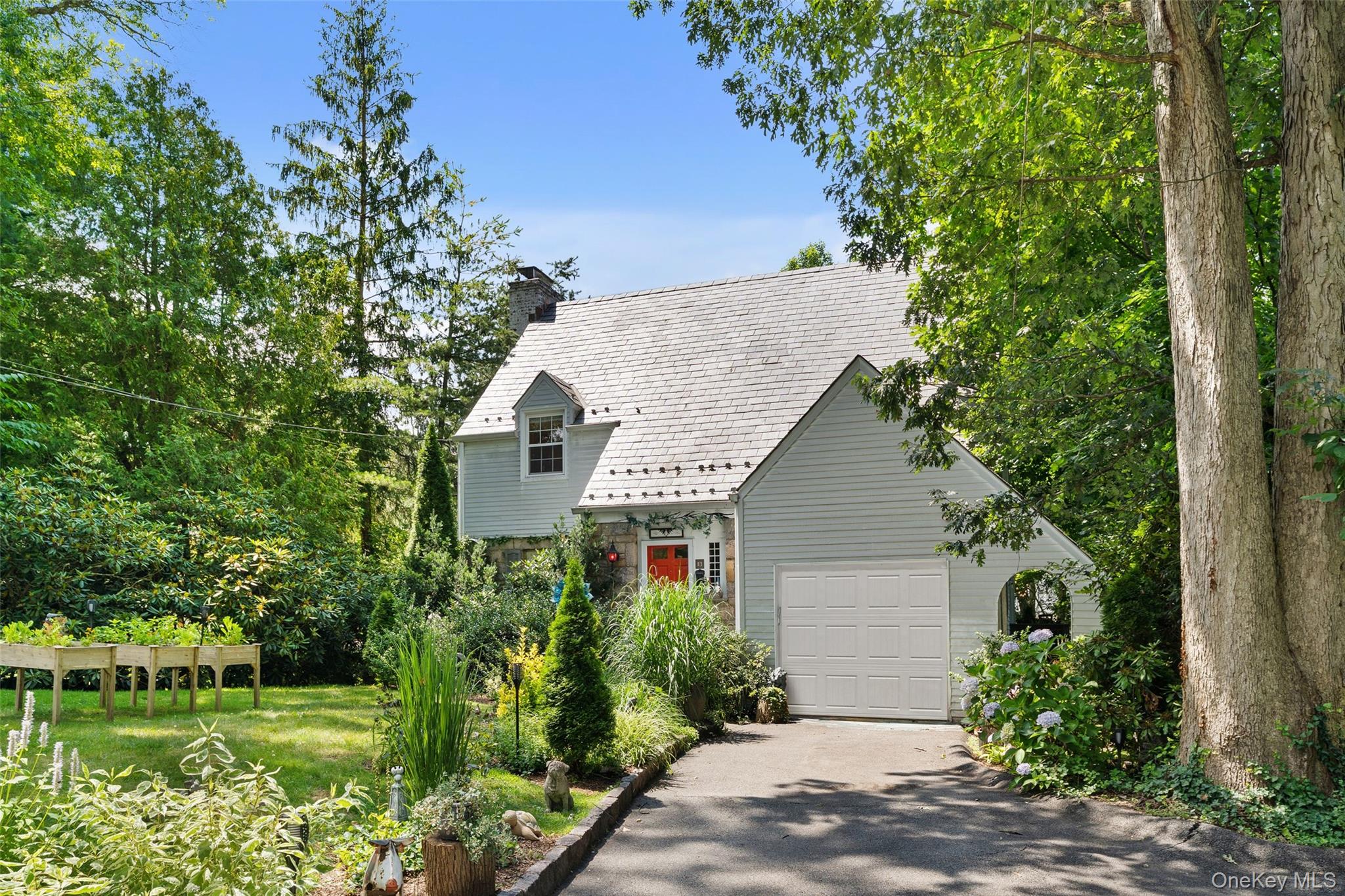 5 Coralyn Road Scarsdale, NY 10583 - Photo 3 of 44 a house view with a garden space