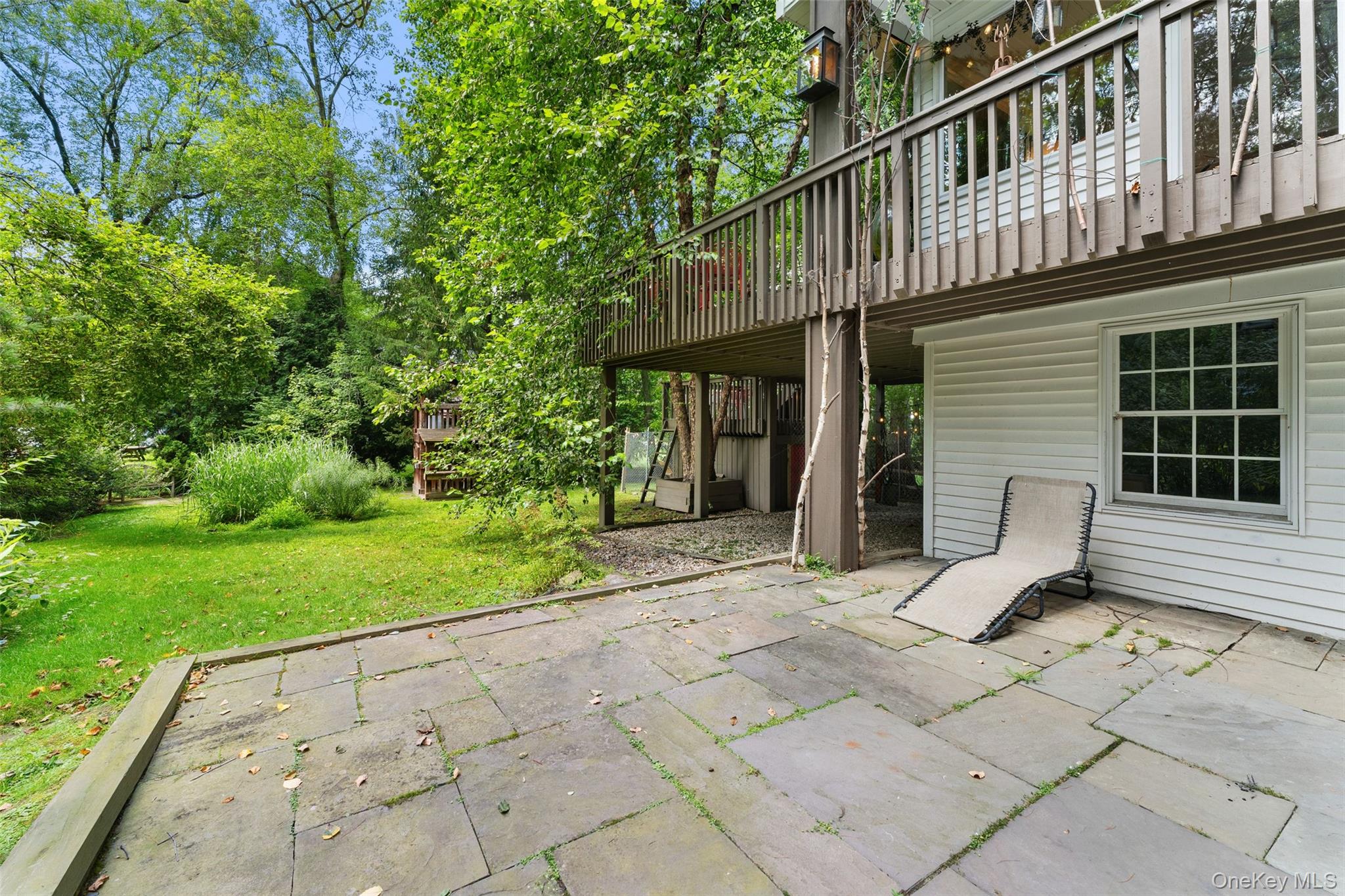 5 Coralyn Road Scarsdale, NY 10583 - Photo 34 of 44 a view of a house with a yard