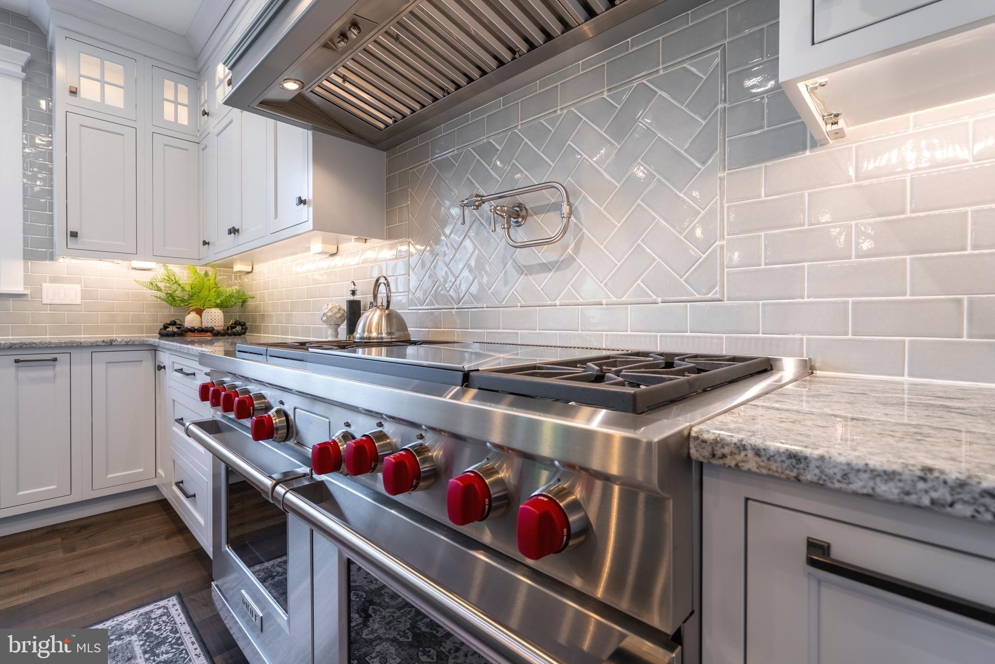 1161 Upper Stump Road Chalfont, PA 18914 - Photo 15 of 102 a kitchen with stainless steel appliances granite countertop a stove and a sink