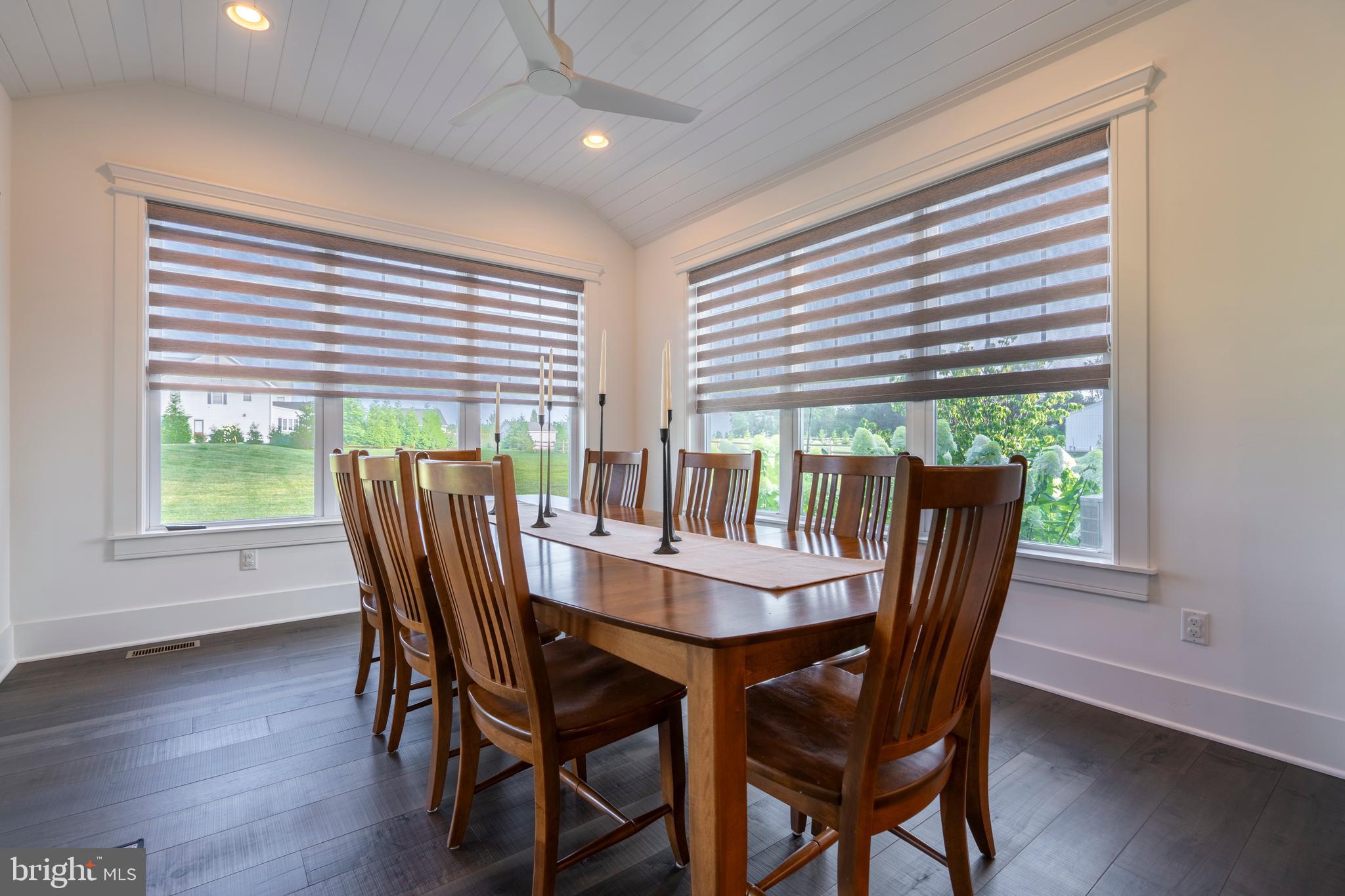 1161 Upper Stump Road Chalfont, PA 18914 - Photo 21 of 102 a view of a dining room with furniture and wooden floor