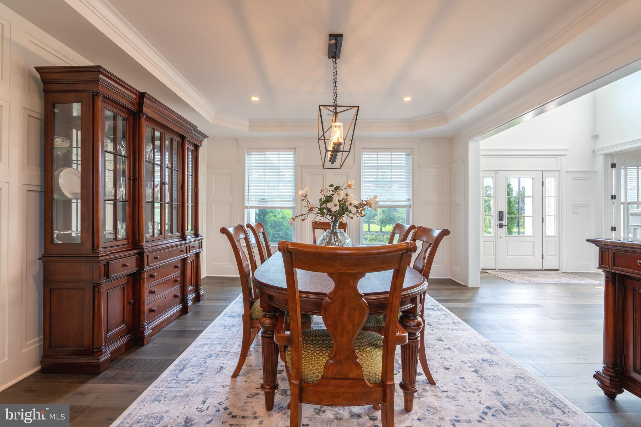 1161 Upper Stump Road Chalfont, PA 18914 - Photo 27 of 102 a view of a dining room with furniture window and wooden floor