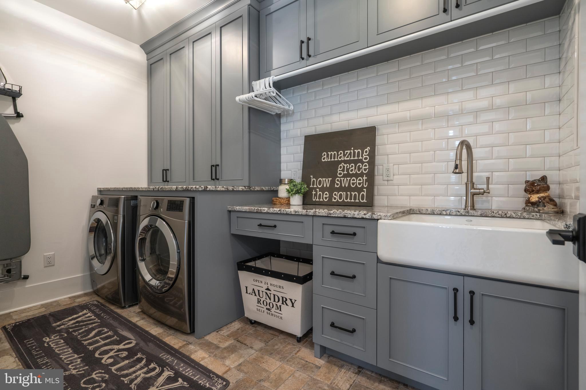 1161 Upper Stump Road Chalfont, PA 18914 - Photo 44 of 102 a utility room with sink dryer and washer