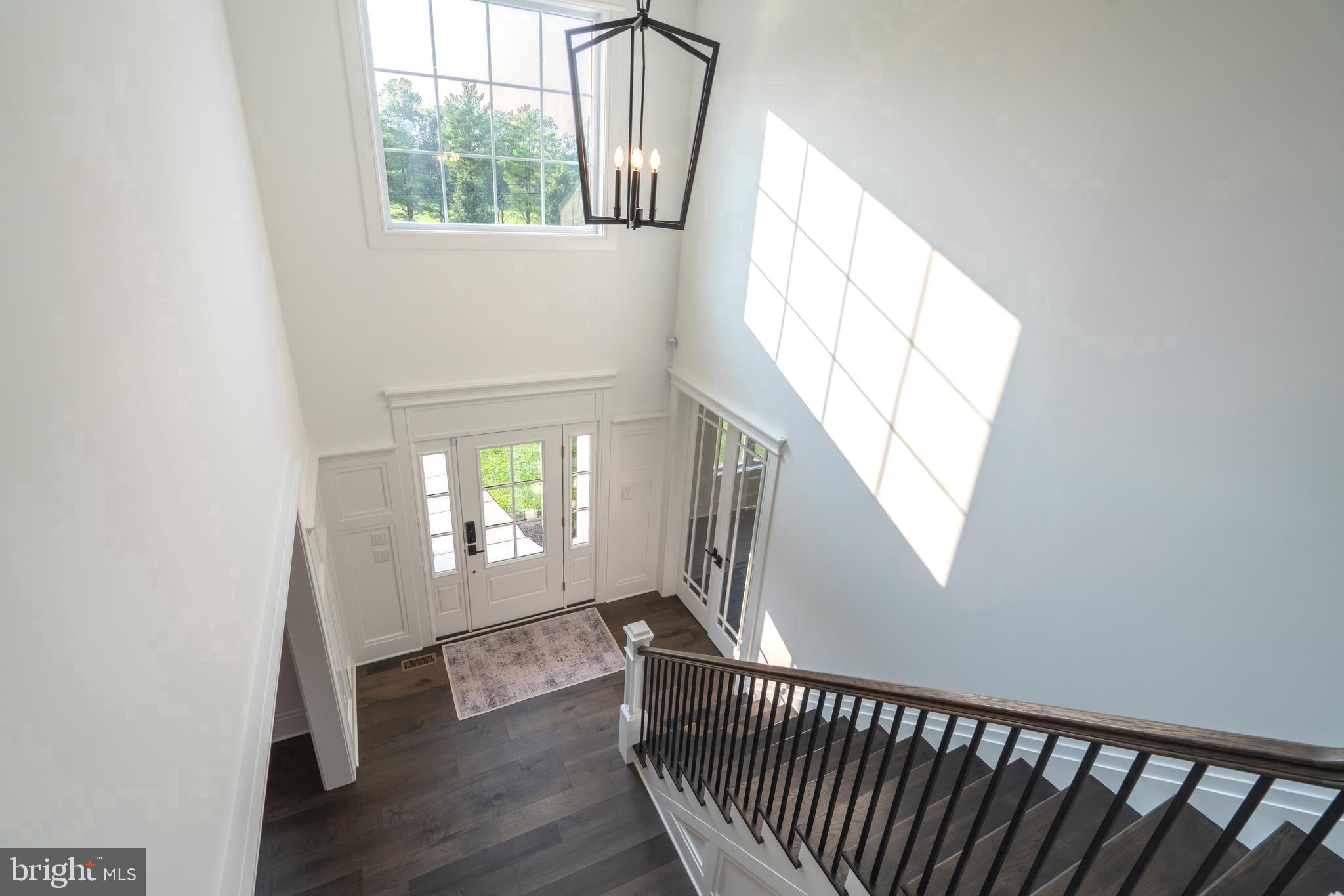 1161 Upper Stump Road Chalfont, PA 18914 - Photo 50 of 102 a view of empty room with wooden floor and fan
