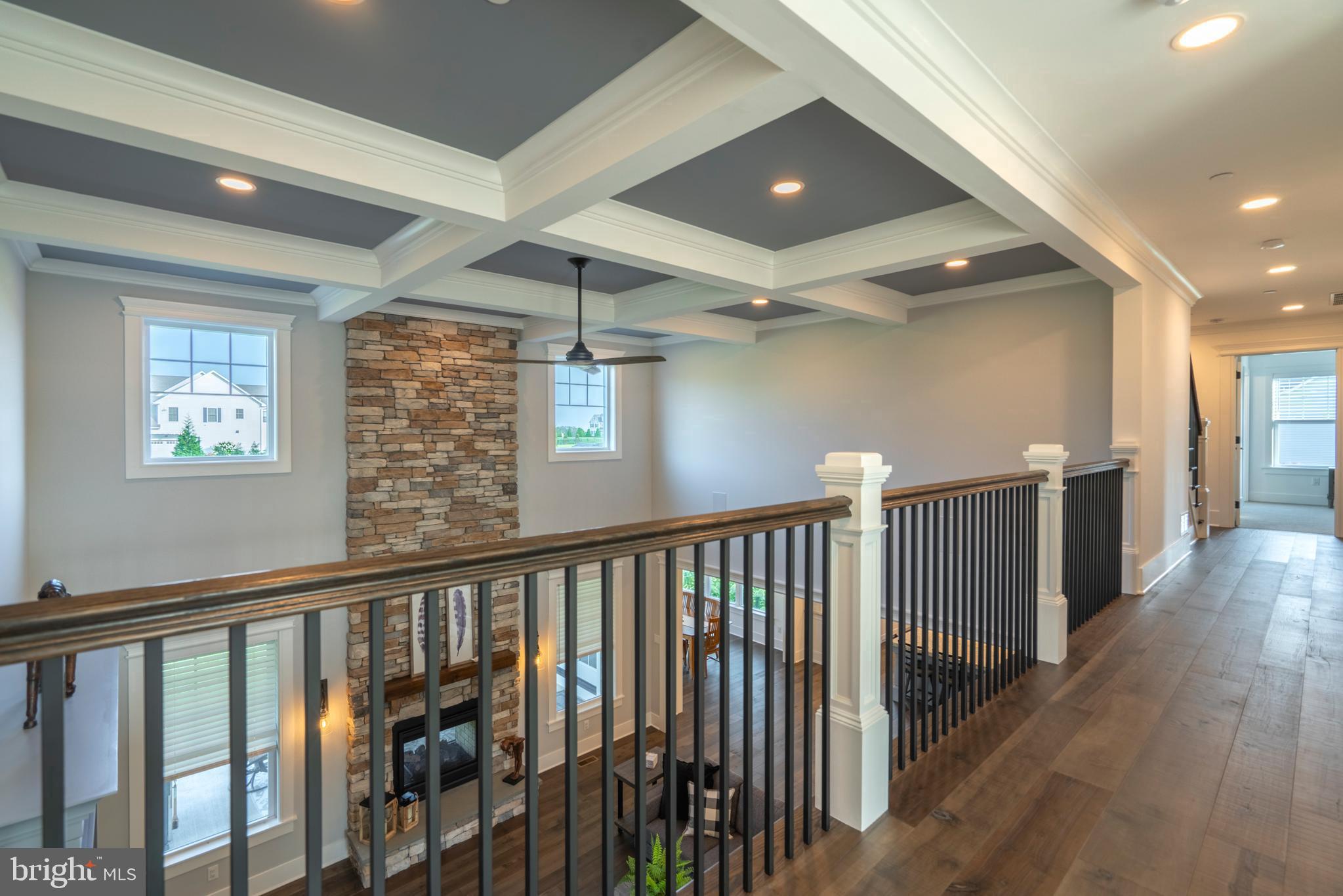 1161 Upper Stump Road Chalfont, PA 18914 - Photo 51 of 102 a view of a hallway with wooden floor and staircase