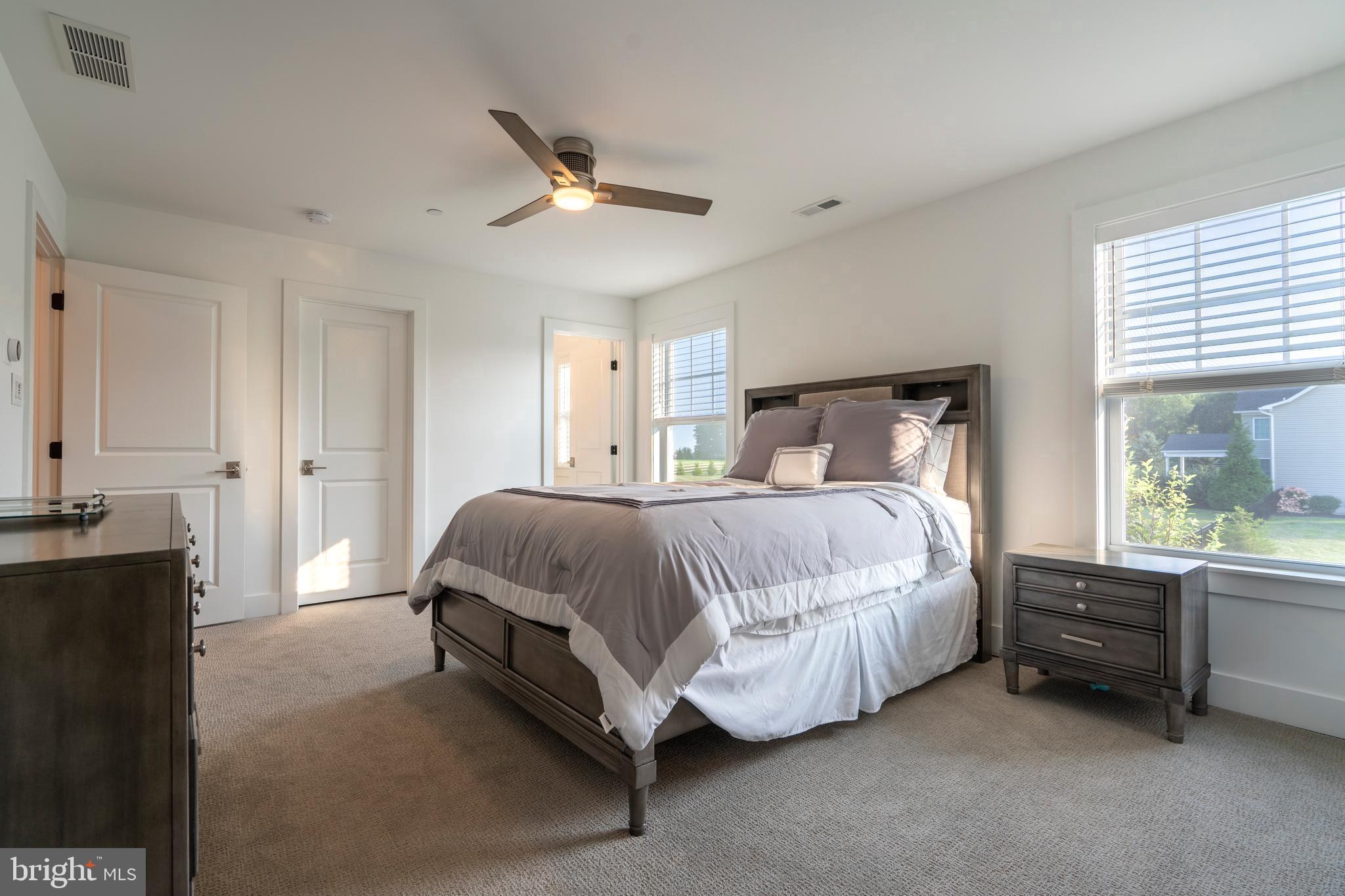 1161 Upper Stump Road Chalfont, PA 18914 - Photo 57 of 102 a spacious bedroom with a bed and window