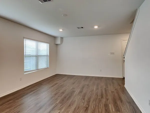 a kitchen with stainless steel appliances a refrigerator sink and microwave