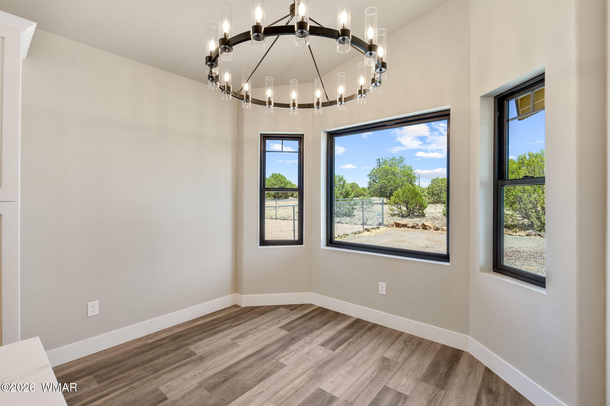 561 South Rock Ridge Drive Show Low, AZ 85901 - Photo 8 of 28 a view of an empty room with a window