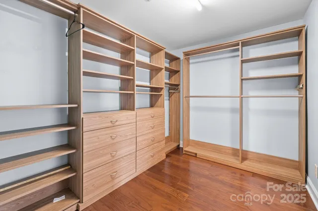 a view of an empty walk in closet