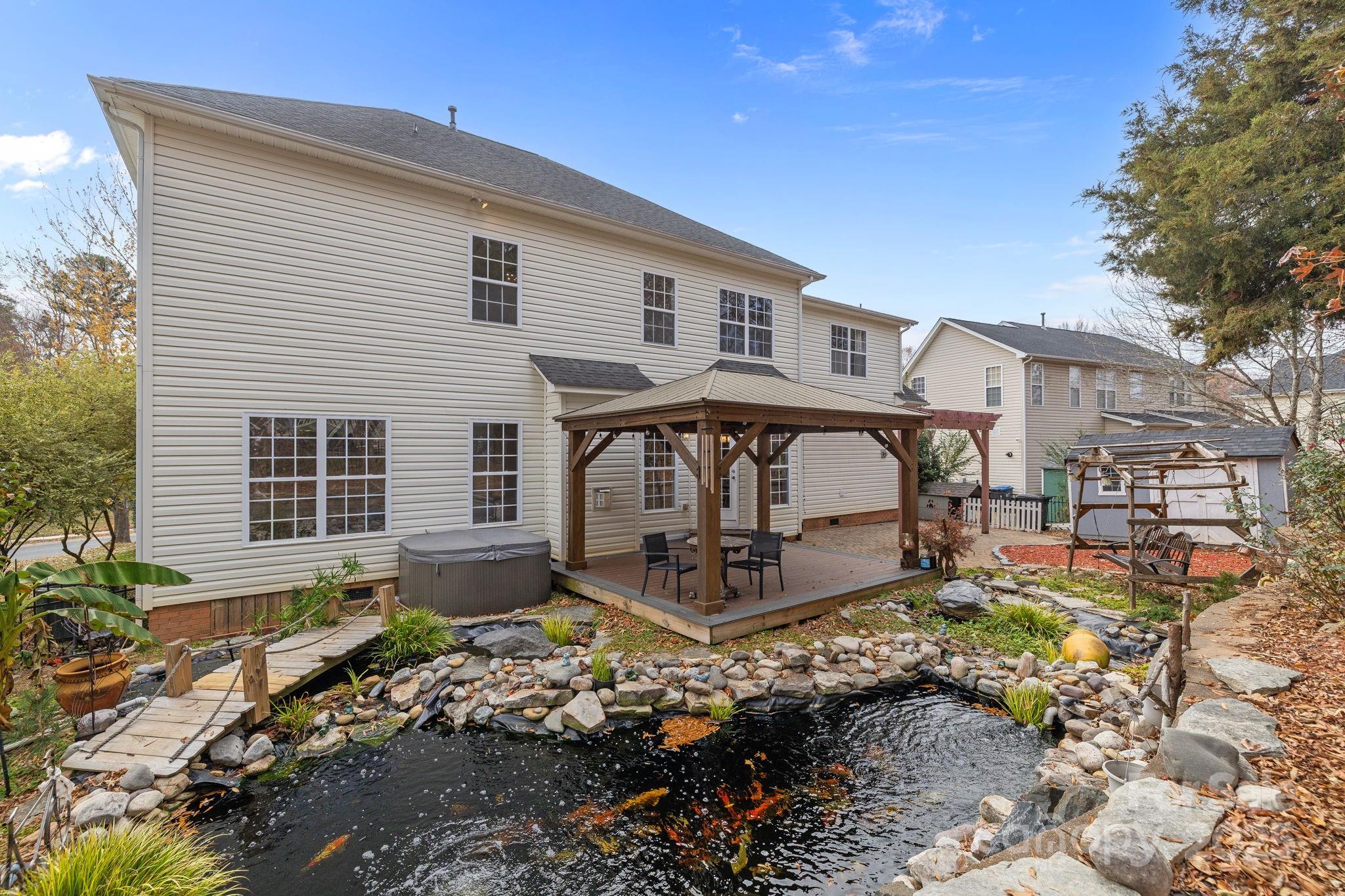 4424 Sunset Rose Drive Fort Mill, SC 29708 - Photo 3 of 47 a front view of a house with garden