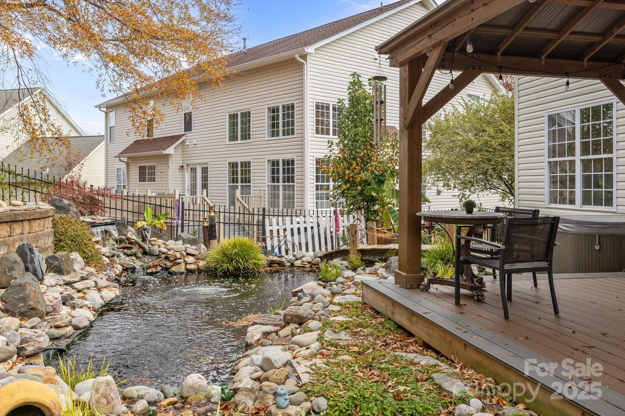 4424 Sunset Rose Drive Fort Mill, SC 29708 - Photo 35 of 47 a view of a house with backyard and sitting area