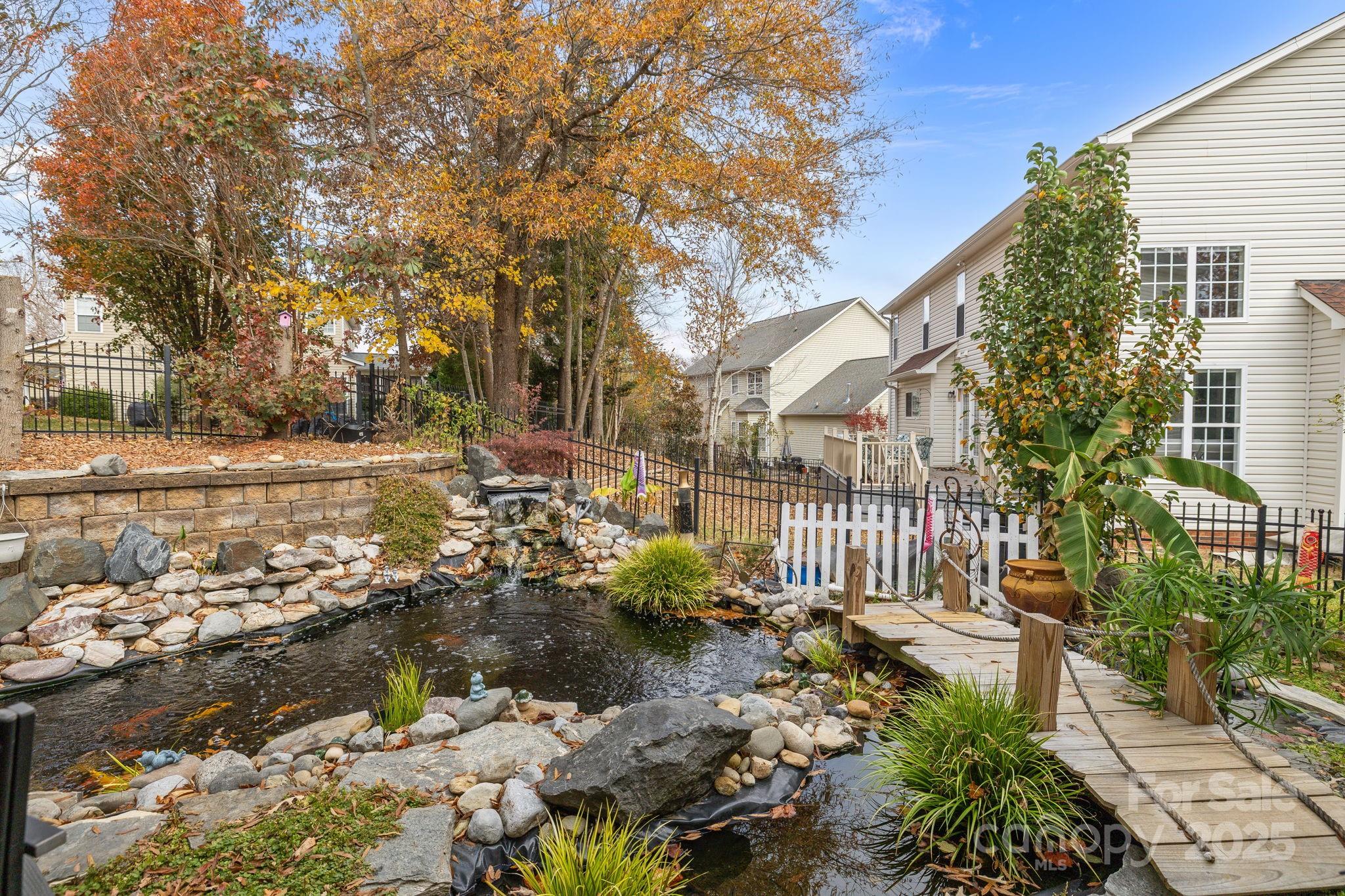 4424 Sunset Rose Drive Fort Mill, SC 29708 - Photo 38 of 47 a view of a yard with plants and large trees