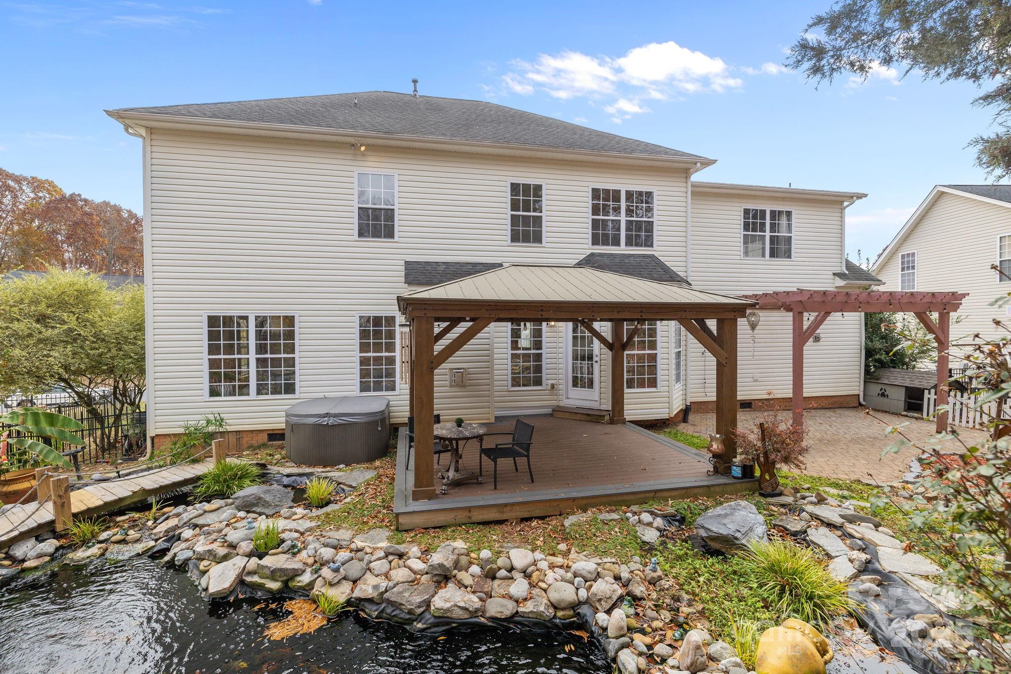4424 Sunset Rose Drive Fort Mill, SC 29708 - Photo 39 of 47 a view of a house with backyard porch and sitting area