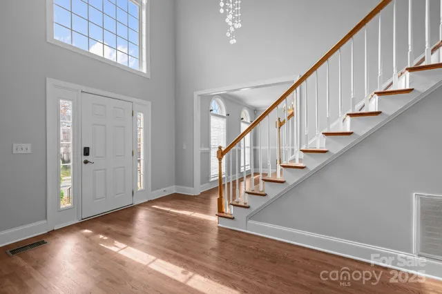 a view of entryway with wooden floor