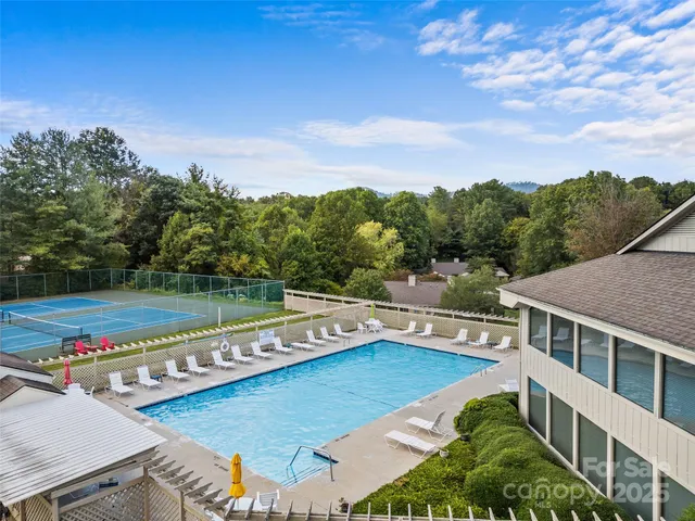 a view of a swimming pool with a mountain view