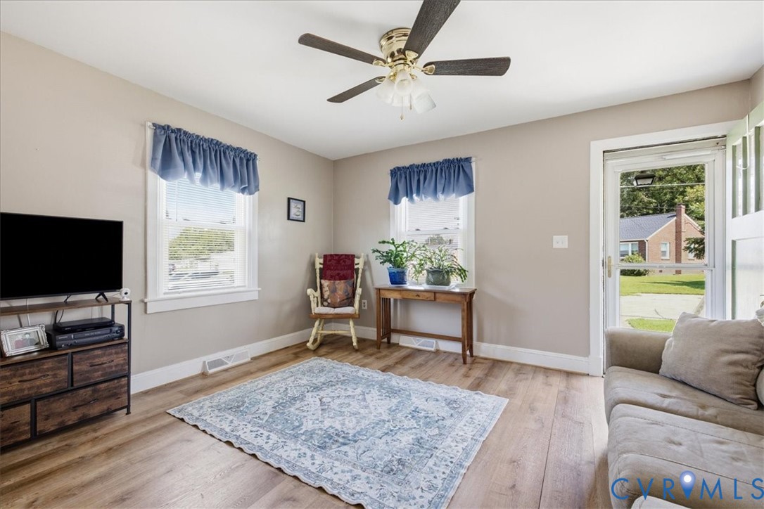Living room with ceiling fan integrated lighting